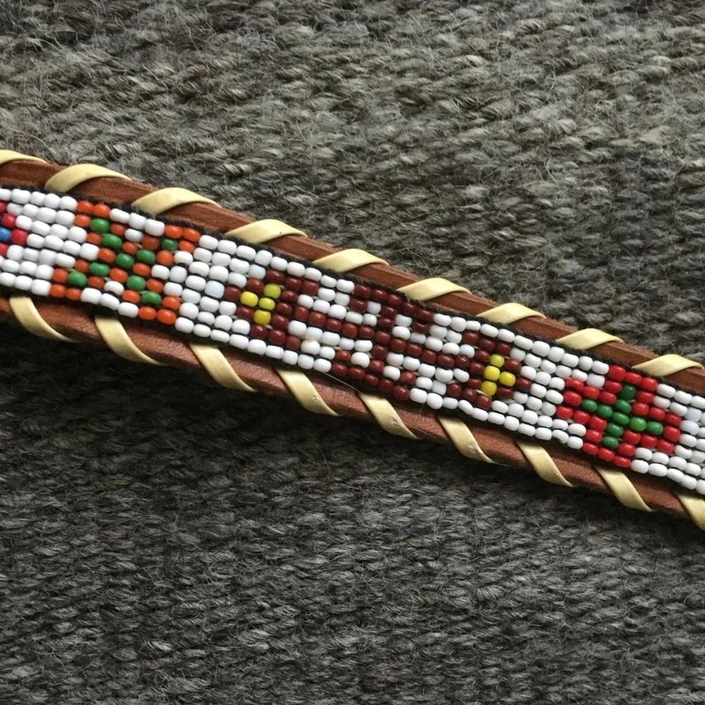 Vintage beaded belt size 26. Firebird design.